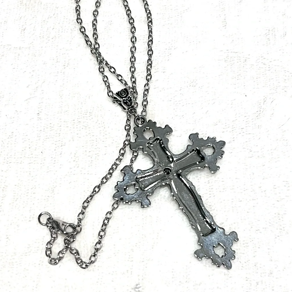 Silver Toned Cross Pendant with Red Gemstone